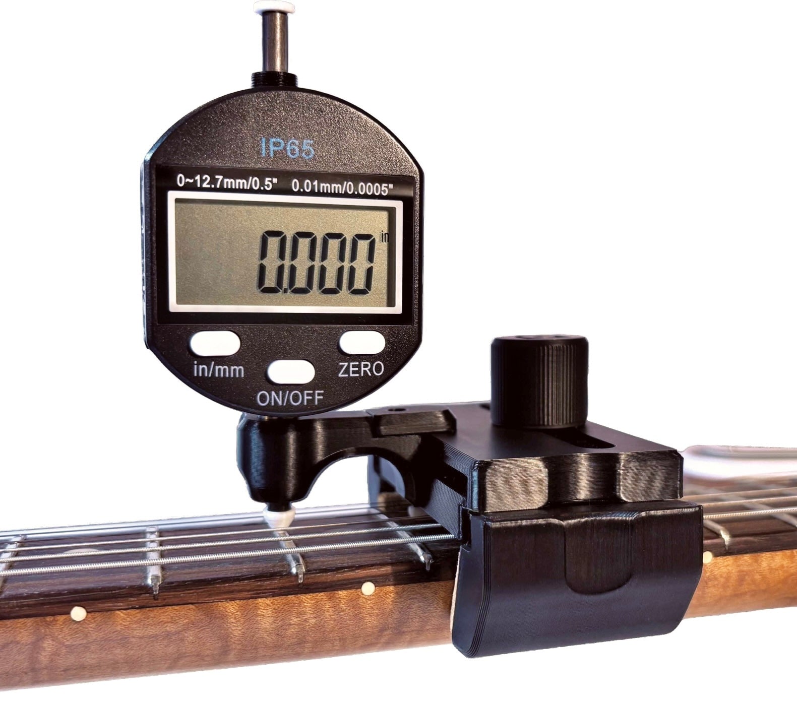 DL Action Finder mounted on a guitar neck, measuring string height